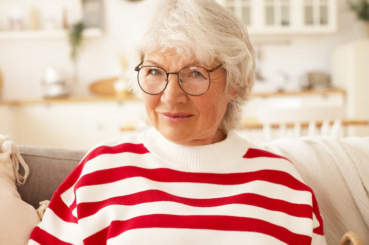 https://smilesplusmn.com/wp-content/uploads/2023/04/age-mature-people-lifestyle-retirement-concept-close-up-shot-happy-charming-elderly-retired-woman-wearing-stylish-striped-sweatshirt-eyeglasses-relaxing-home-smiling-joyfully_344912-1534.jpg