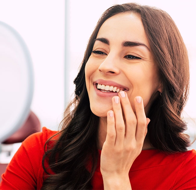https://smilesplusmn.com/wp-content/uploads/2023/04/porcelain-crowns-santa-barbara-ca-1.jpg